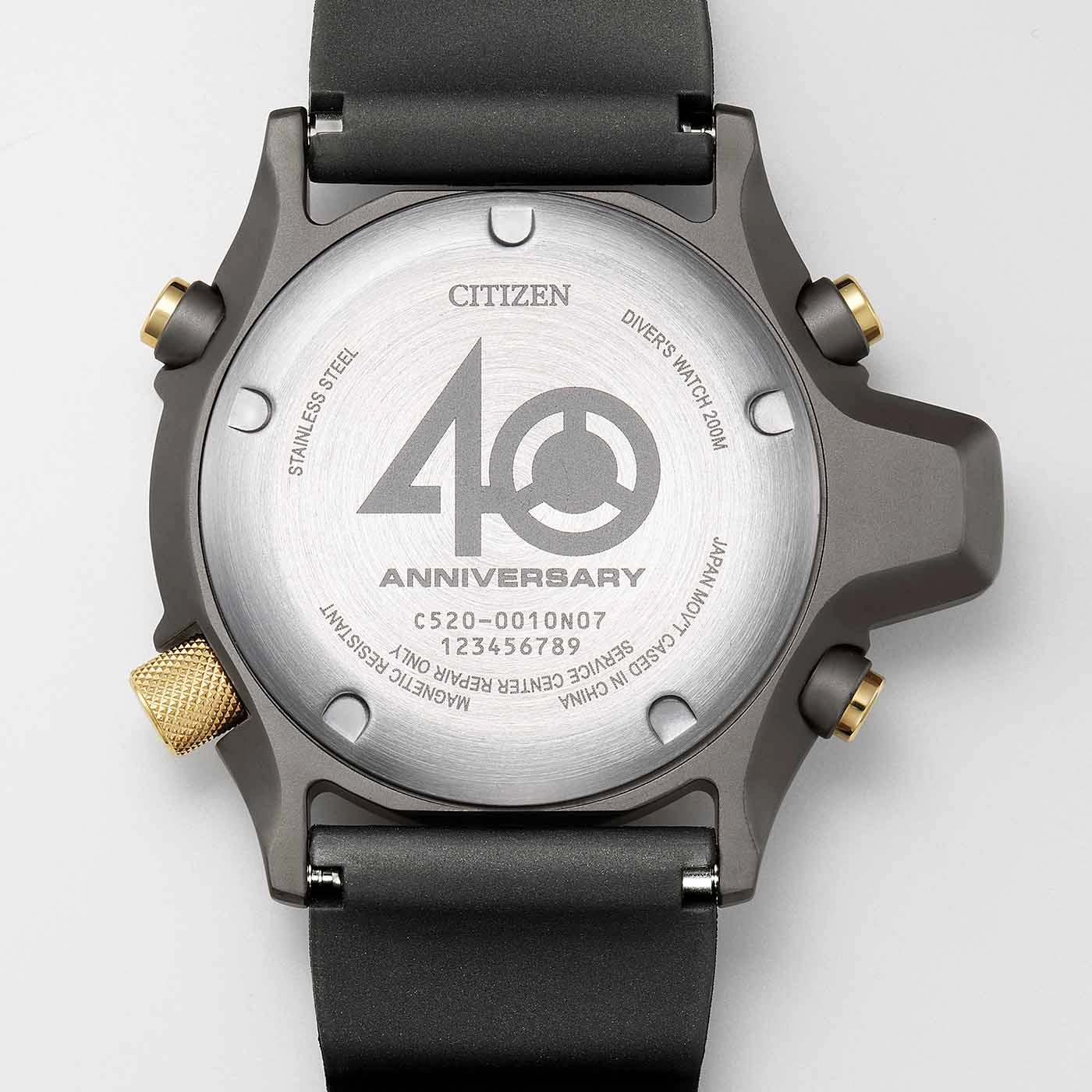 Citizen watch back with text: stainless steel, anniversary, diver's watch, Japan.