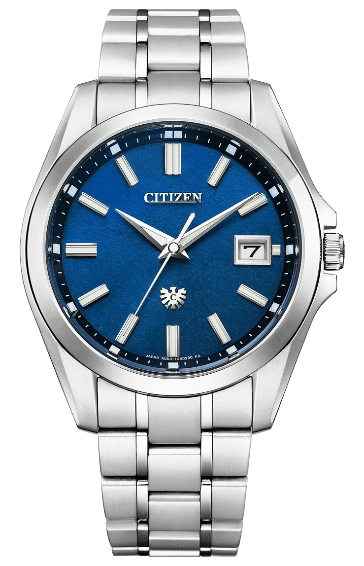 Citizen watch with blue face and silver strap, date display.