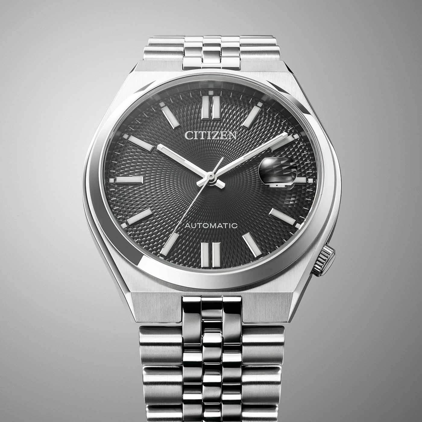 Citizen automatic watch with a black dial and silver bracelet.