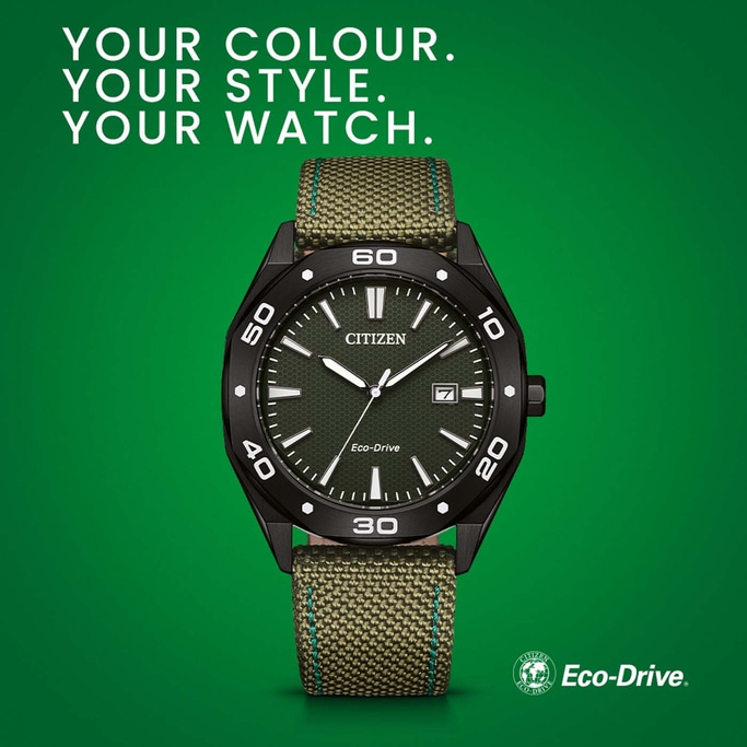 Citizen watch with green strap on a green background, Eco-Drive.