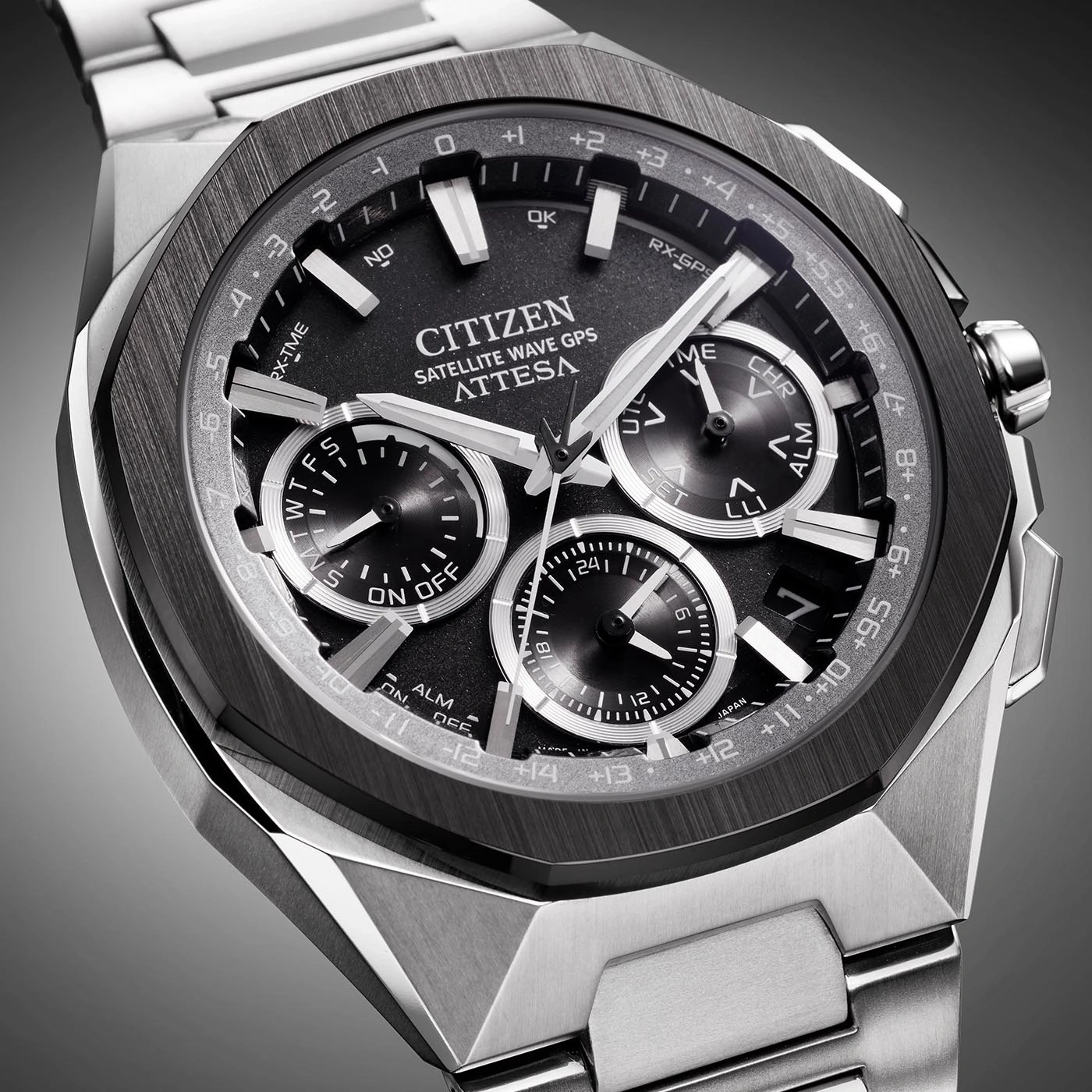 Close-up of a Citizen Attesa watch with a black dial and silver bracelet.