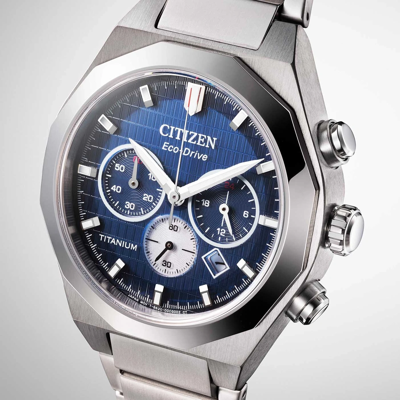 Citizen Eco-Drive titanium watch with blue dial and chronograph features.