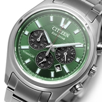 Close-up of a green Citizen Eco-Drive watch with silver band.