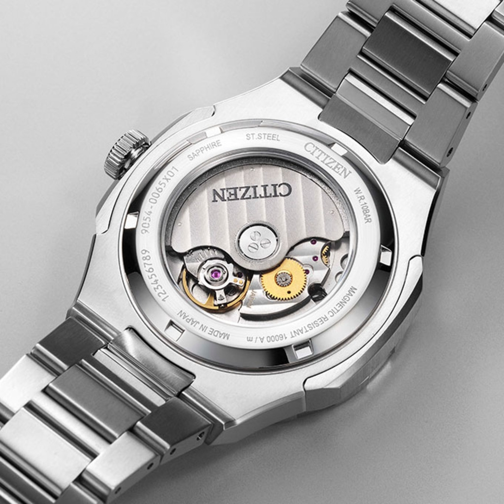 Citizen watch back with visible mechanism, sapphire, stainless steel, Japan made.