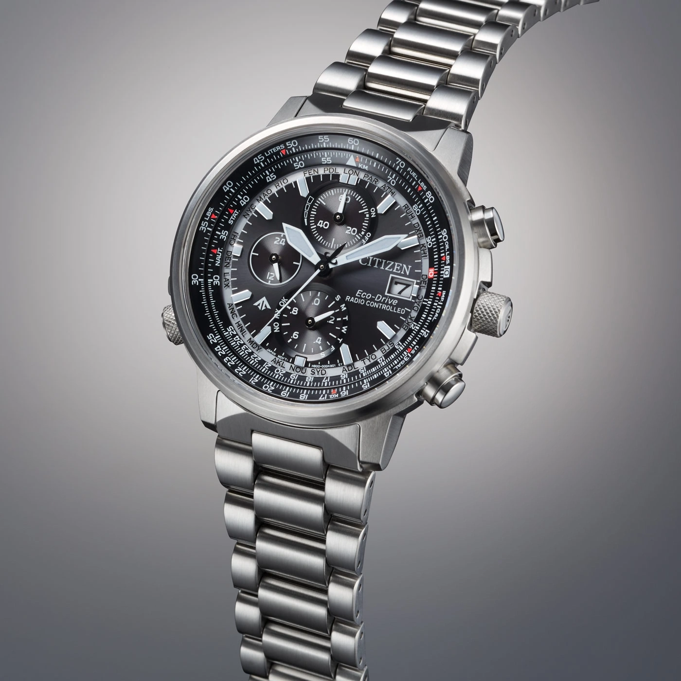 Citizen watch with black face, silver band, and multiple dials, showing time and date.