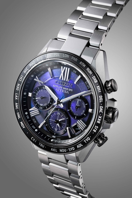 Close-up of a Citizen Attesa watch with a blue face and metallic strap.