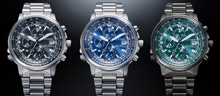 Three Citizen watches with different colored faces and stainless steel bands.