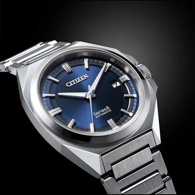 Citizen Series 8 automatic watch with a blue dial and silver bracelet.