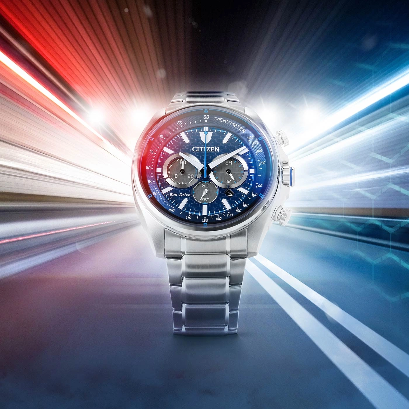 Citizen watch with blue face and silver band, tachymeter, Eco-Drive, speed lines.