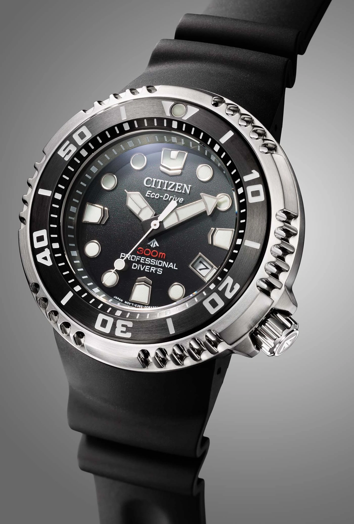 Close-up of a Citizen Eco-Drive professional diver's watch with black dial and strap.