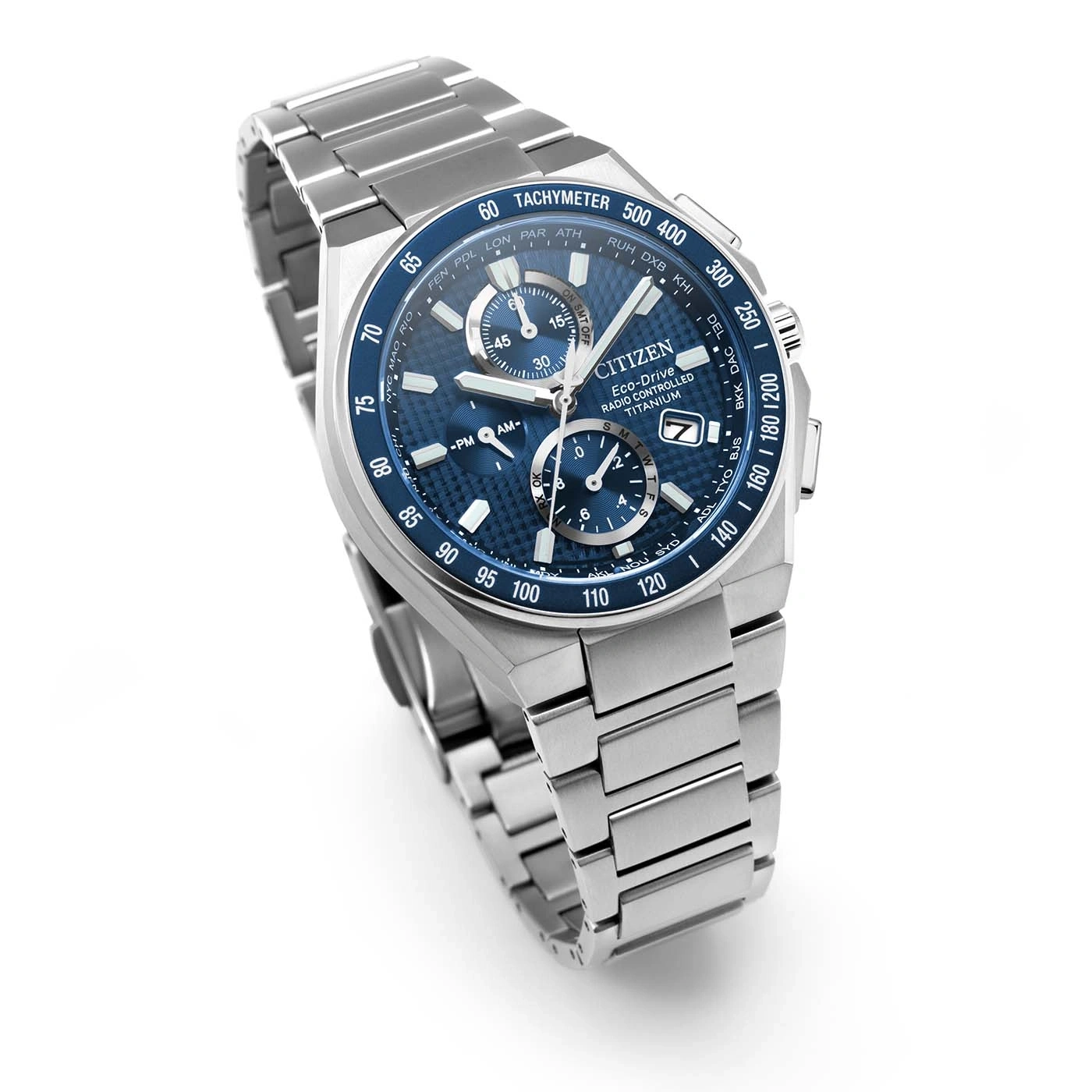A blue Citizen Eco-Drive radio controlled titanium watch with a metal band
