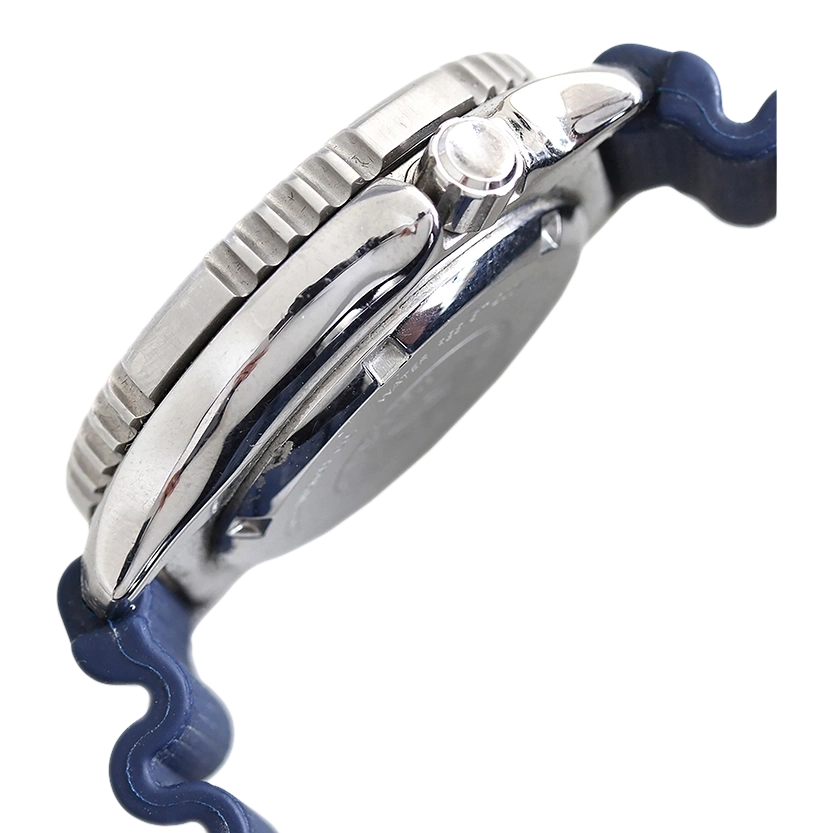 Close-up of a silver watch with a blue strap, side view, shiny.