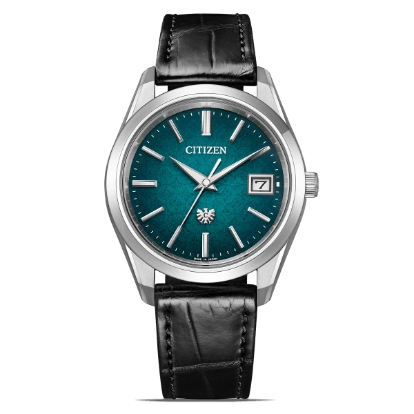 Citizen watch with a teal face and black leather strap.