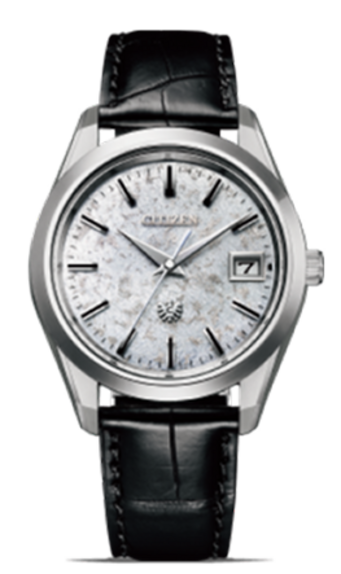Citizen watch with a textured face and black leather strap, elegant design.