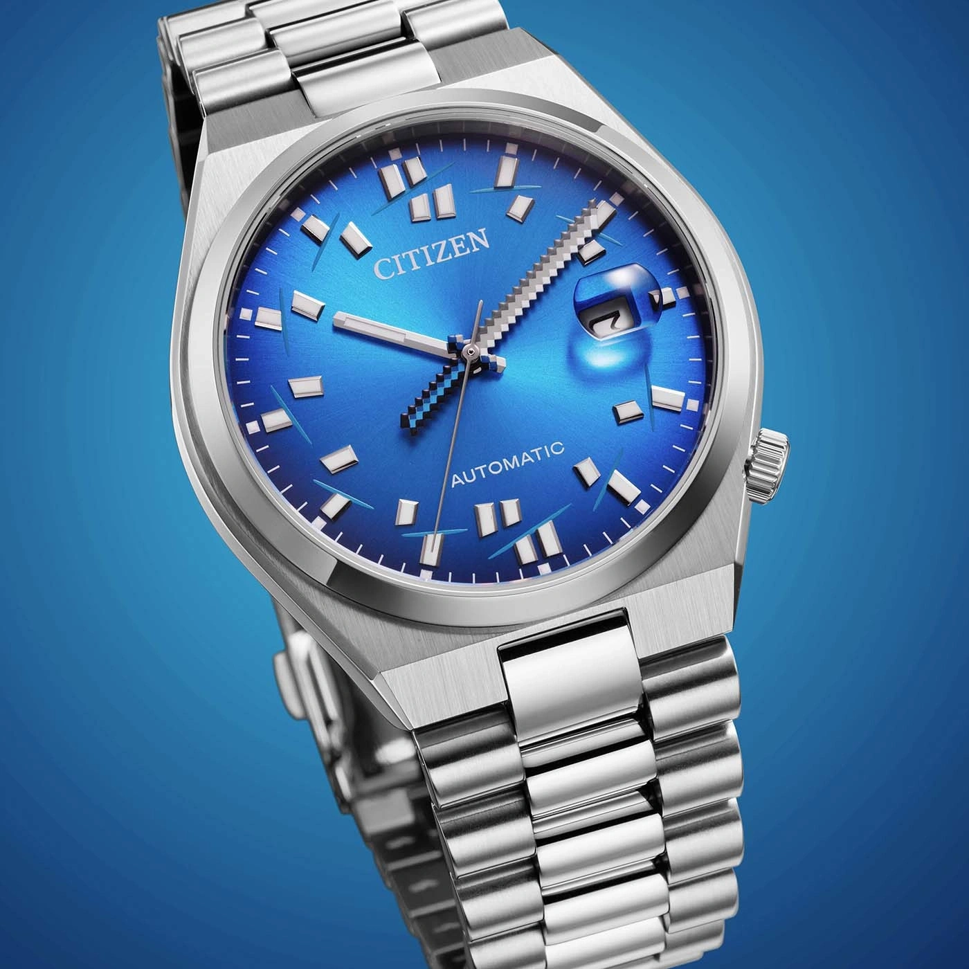 A close-up shot of a blue Citizen automatic watch with a metal band.