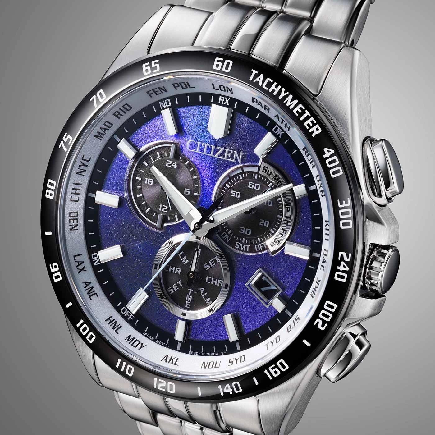 Citizen watch with blue face, silver band, and chronograph features.