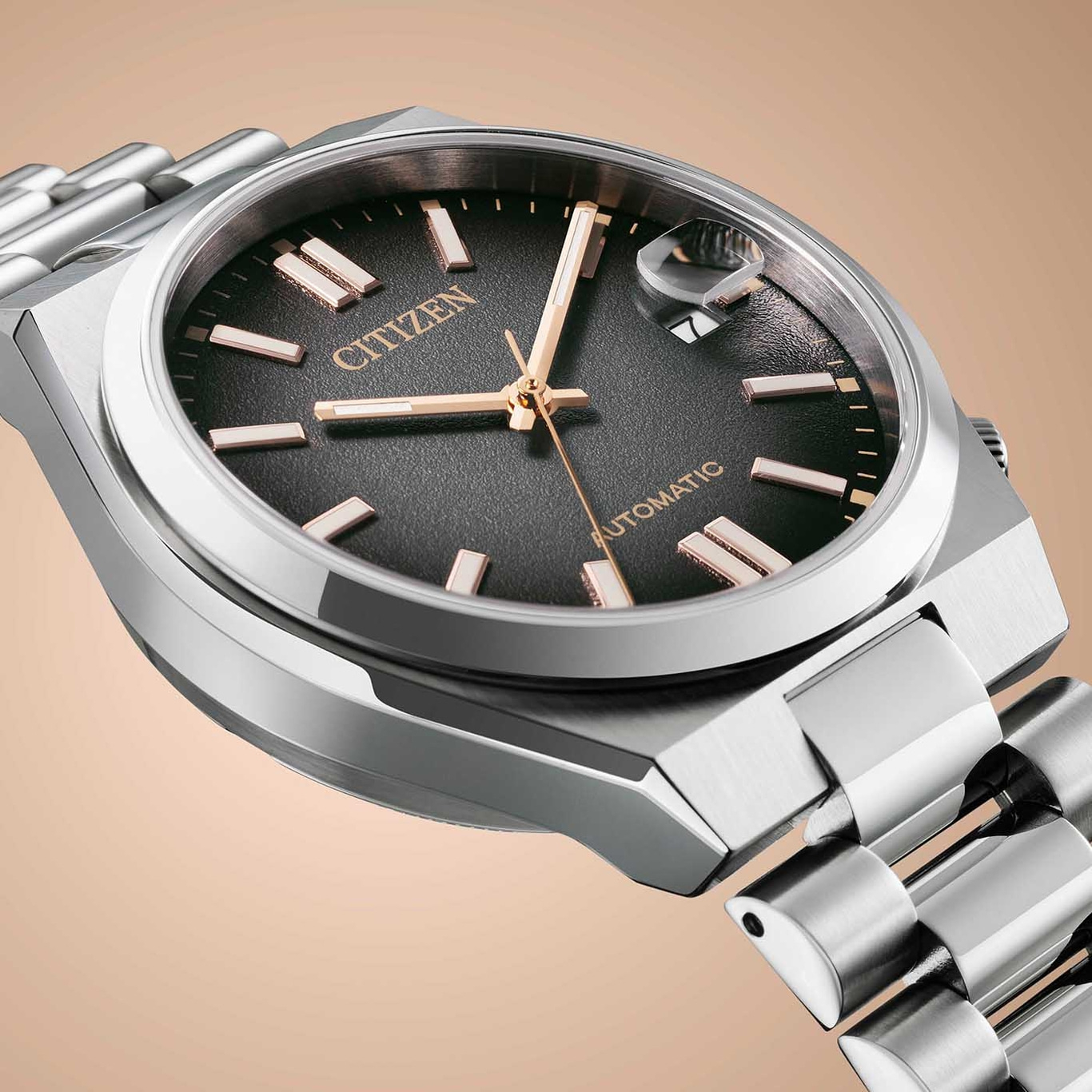 Citizen automatic watch with a black dial and silver bracelet.
