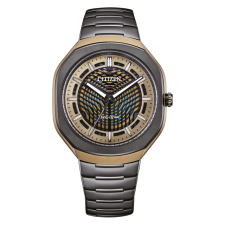 A Citizen Eco-Drive watch with a gold and blue patterned dial and a metal band.