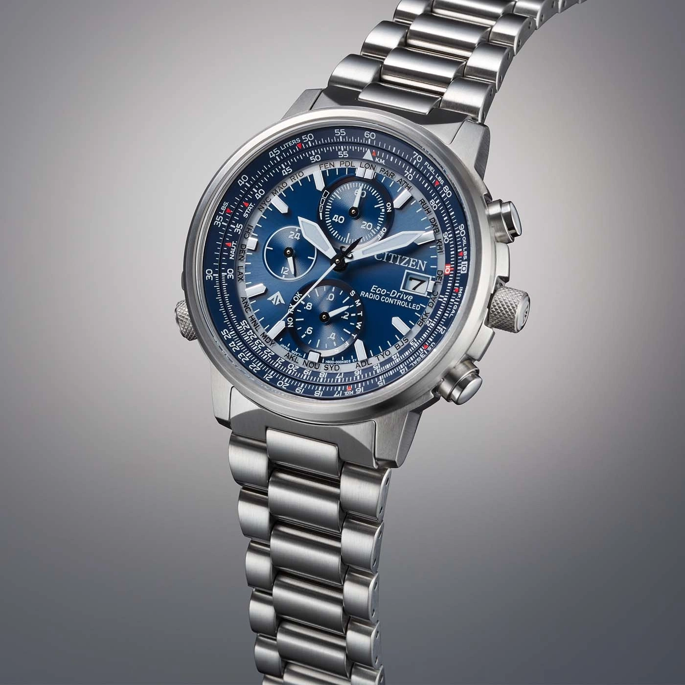 Citizen watch with blue face and silver band, radio controlled, Eco-Drive technology.