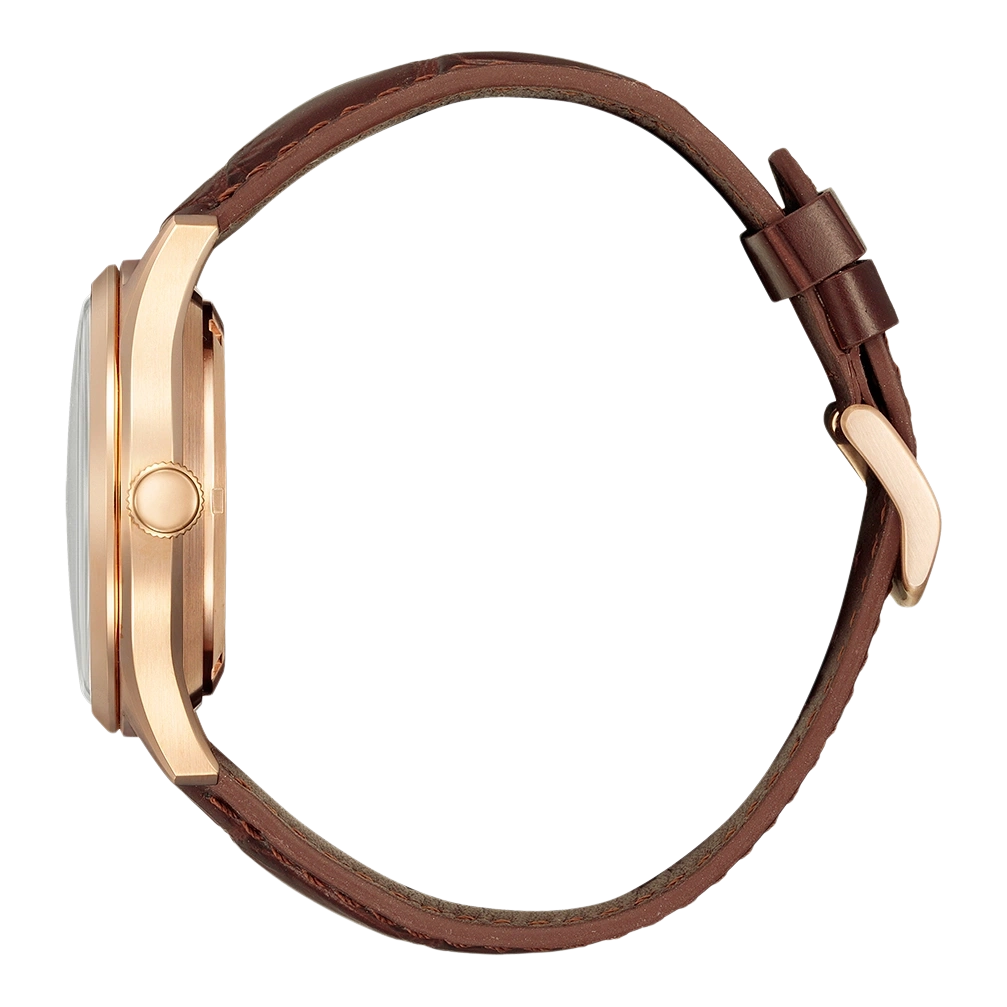 A side view of a gold watch with a brown leather strap.