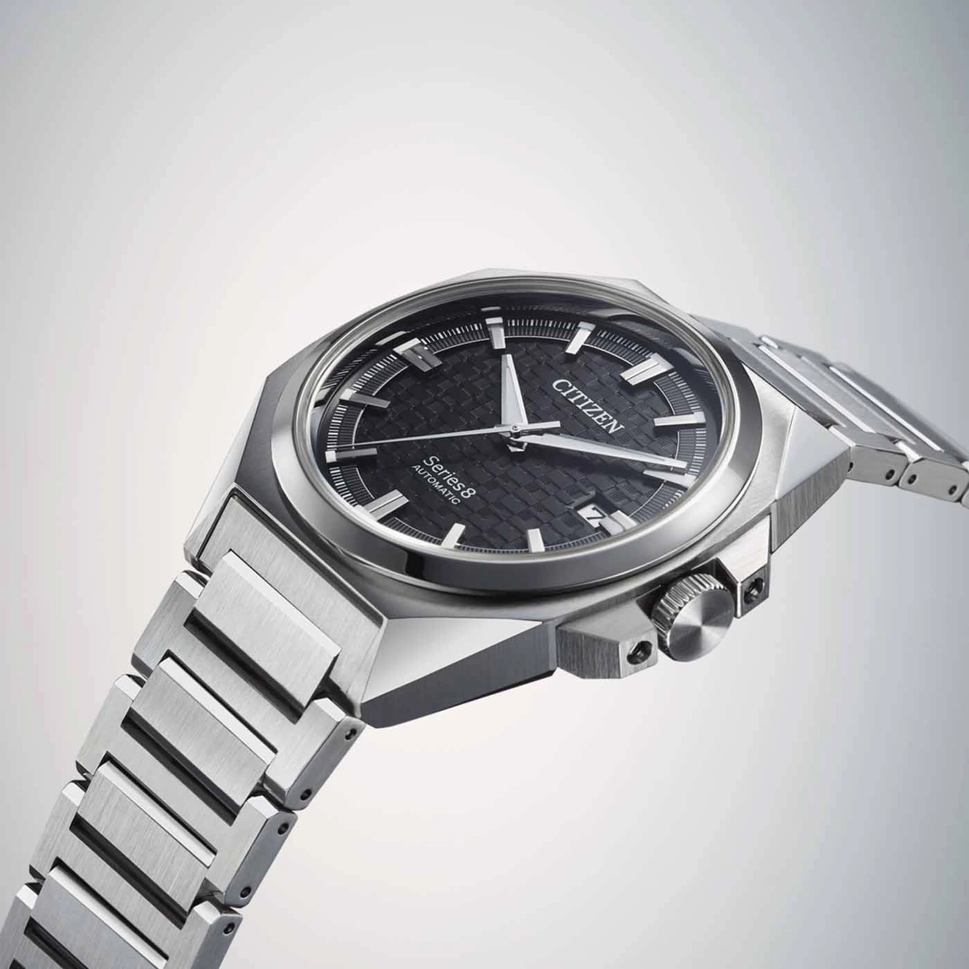 Citizen Series 8 automatic watch with a black dial and steel bracelet.