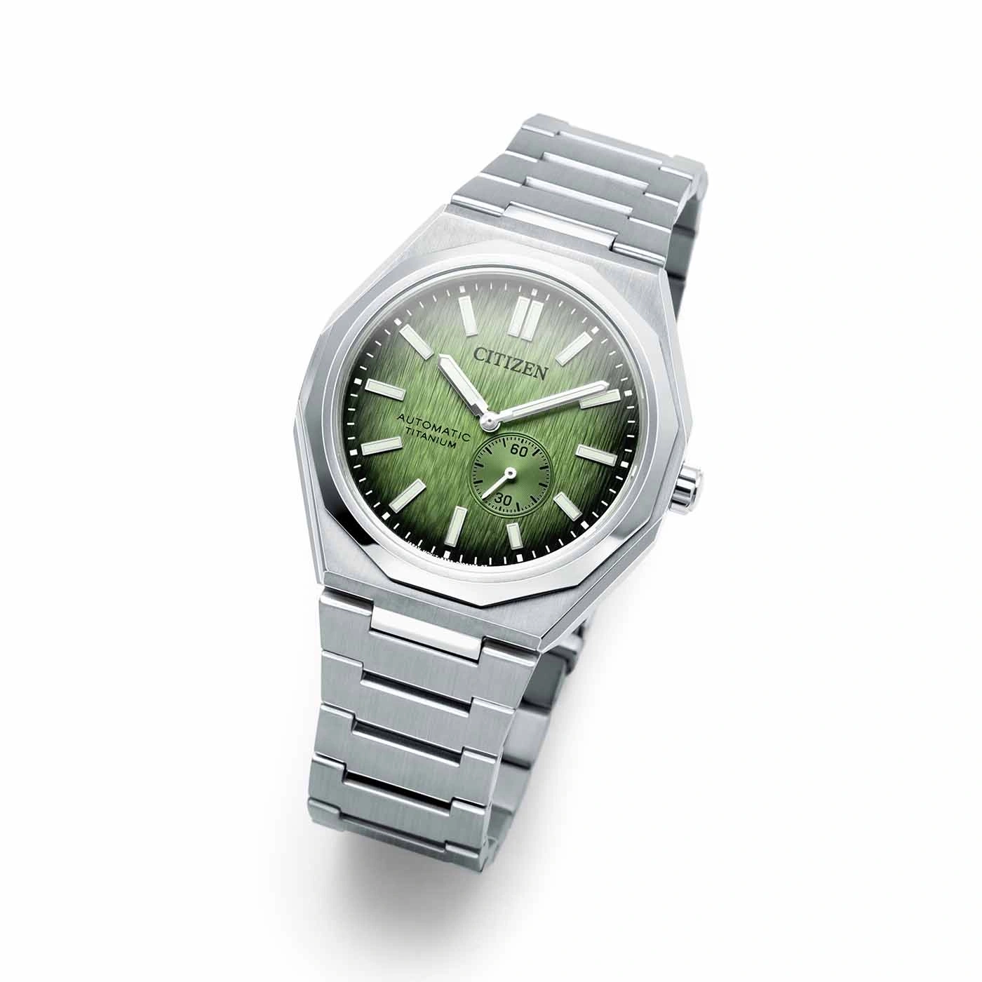 Citizen watch with green face and titanium strap, elegant design.