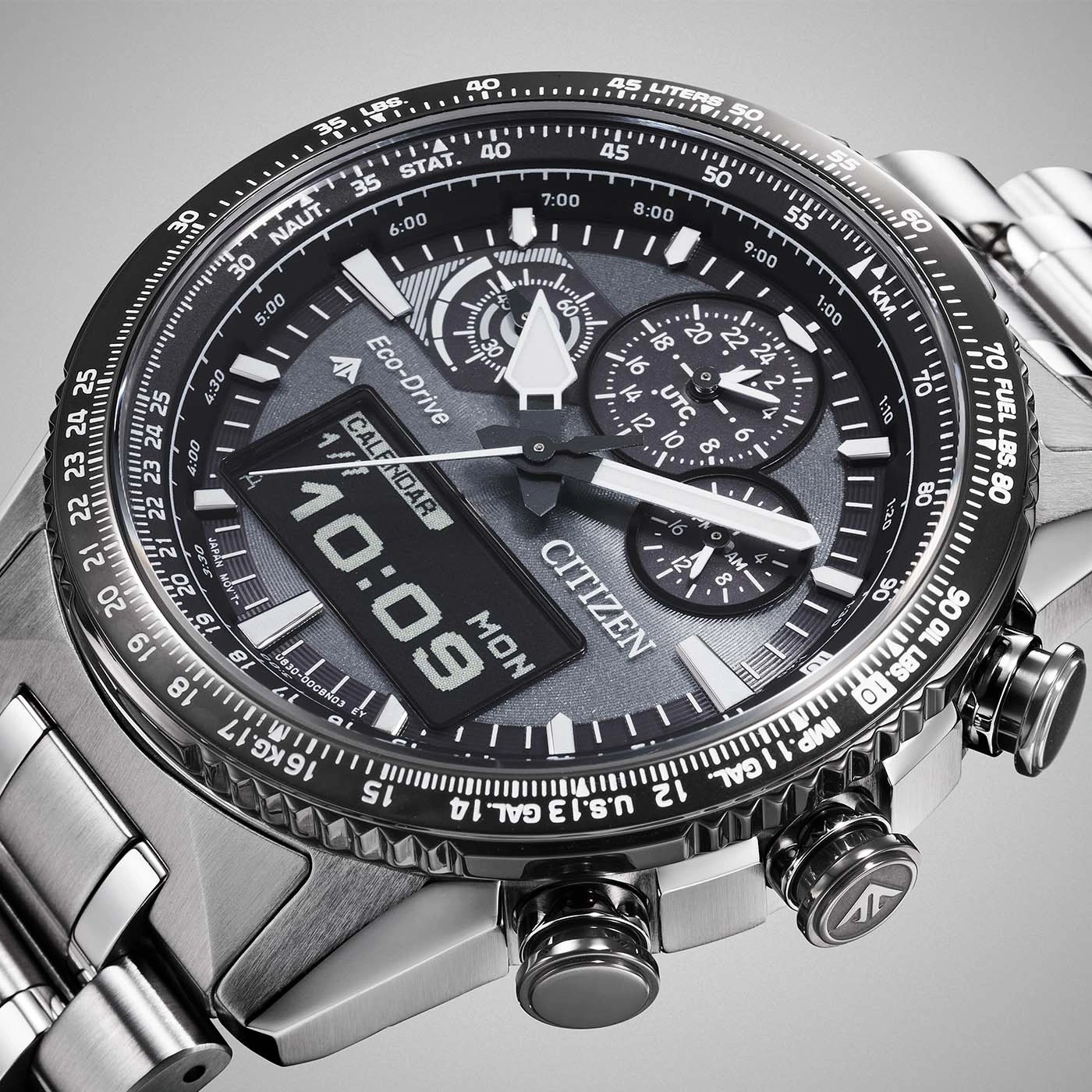 Close-up of a Citizen watch with multiple dials and digital display showing time and date.