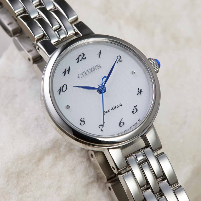 Citizen watch with white face, silver band, and blue hands. Eco-Drive.