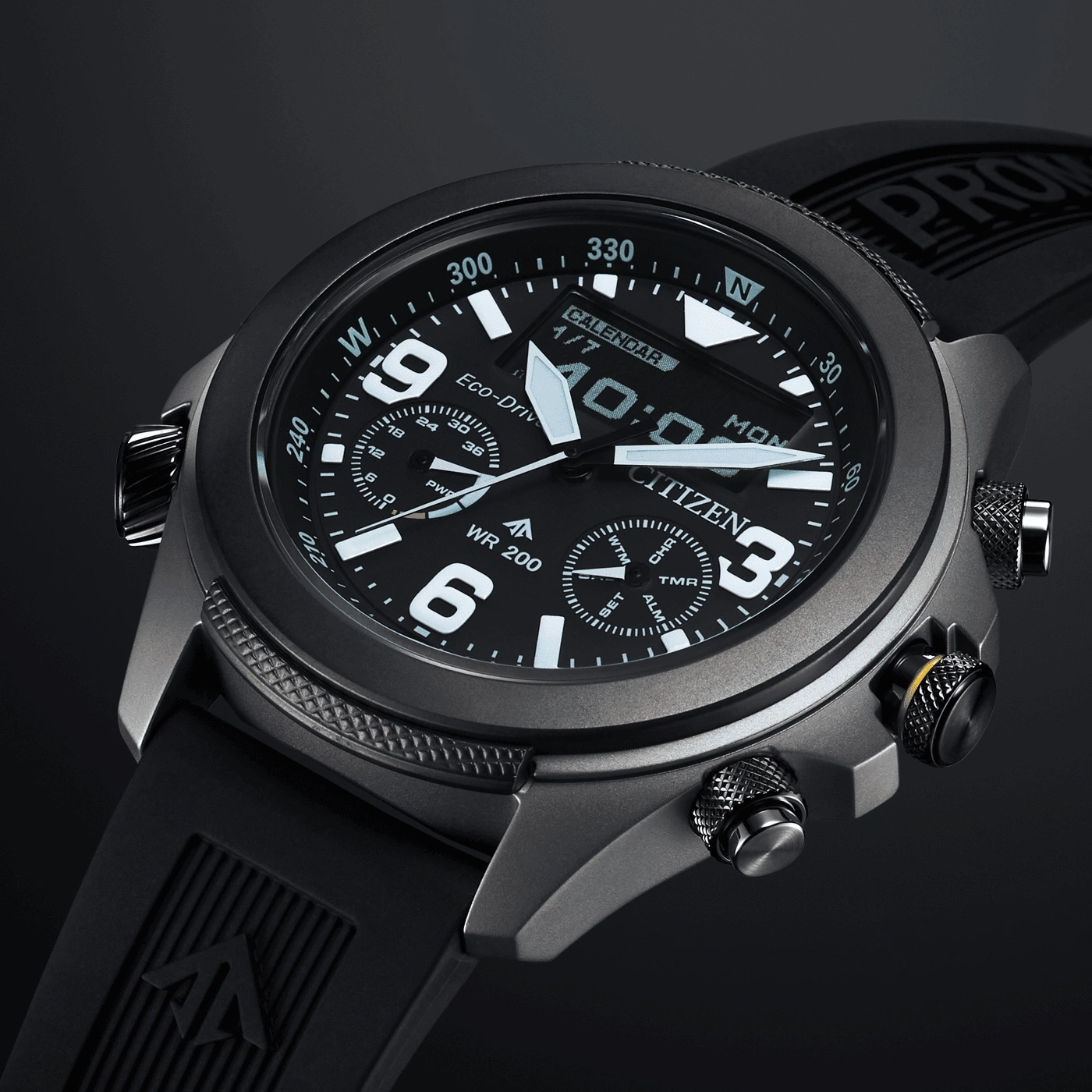 A close-up shot of a Citizen Eco-Drive watch, showcasing its detailed design with a black dial, digital display, and multiple buttons.
