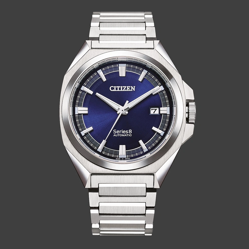 Citizen Series 8 automatic watch with blue dial and silver bracelet.