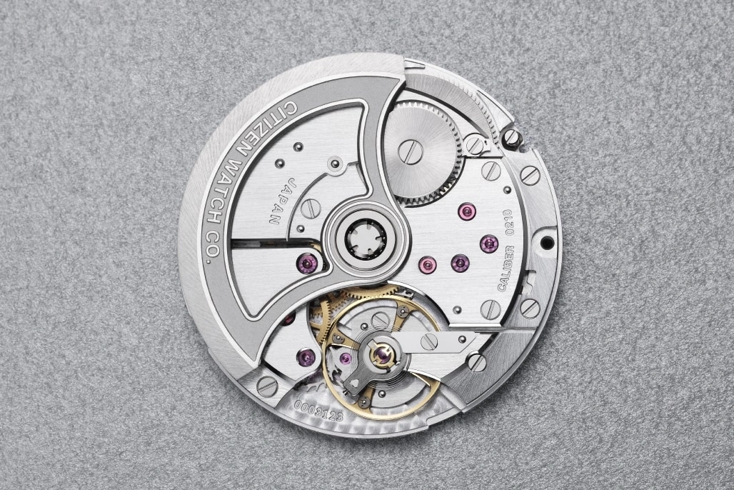 Watch mechanism with gears and Citizen Watch Co. markings, Japan.