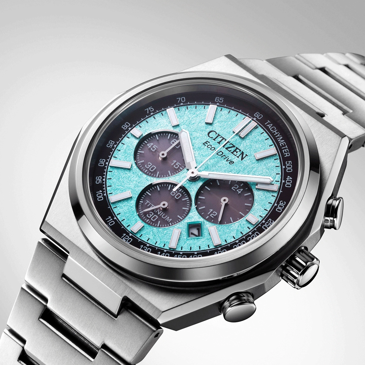 Citizen Eco-Drive watch with a blue face and titanium band.