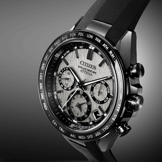 Citizen Attesa watch, black and silver, satellite wave GPS, close-up shot, detailed design.
