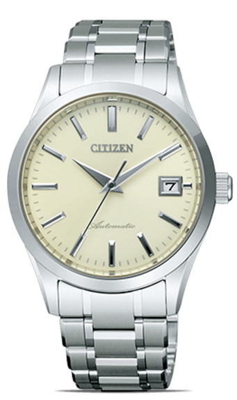 Citizen automatic watch with a silver band and cream face, date display.