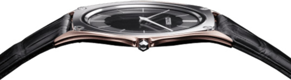 Elegant watch with black leather strap and a dark face, close-up shot.