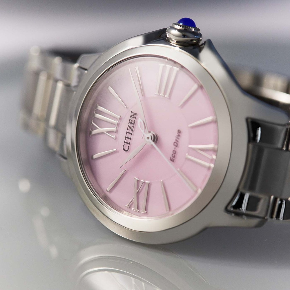 Citizen watch with pink face and silver band, Roman numerals, Eco-Drive.