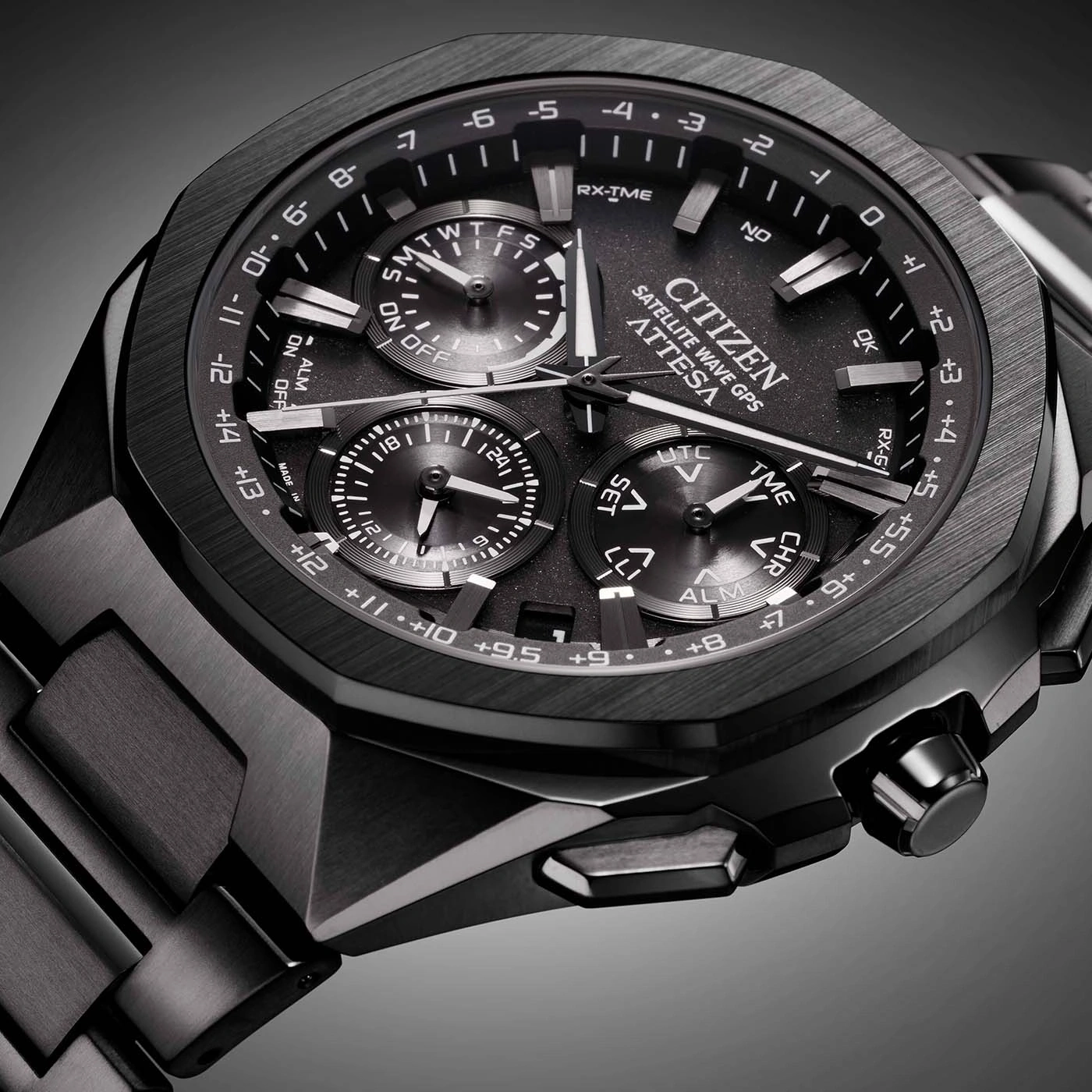 Black Citizen Attesa watch with multiple dials and a textured bezel.
