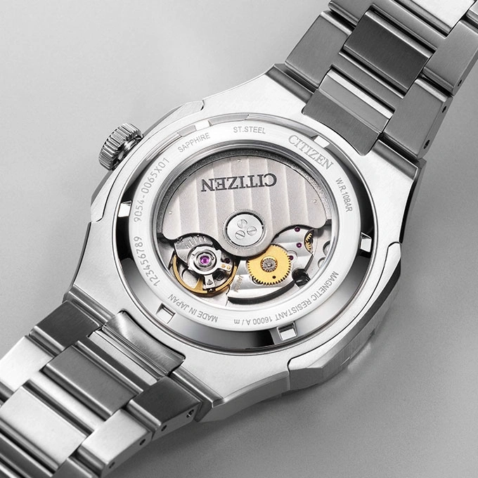 Citizen watch back with visible mechanism, sapphire, stainless steel, Japan made.