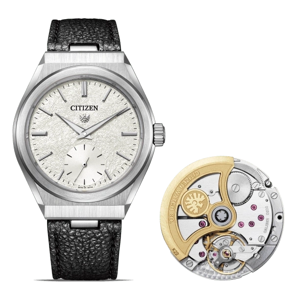 Citizen watch with a textured face and exposed movement.