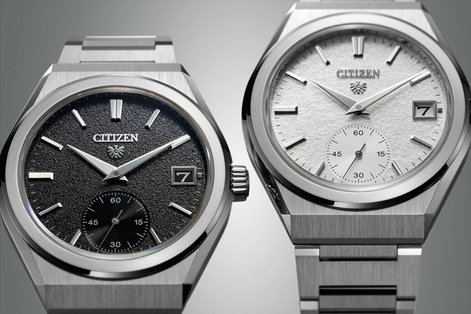 Two Citizen watches with textured dials and date displays, elegant design.