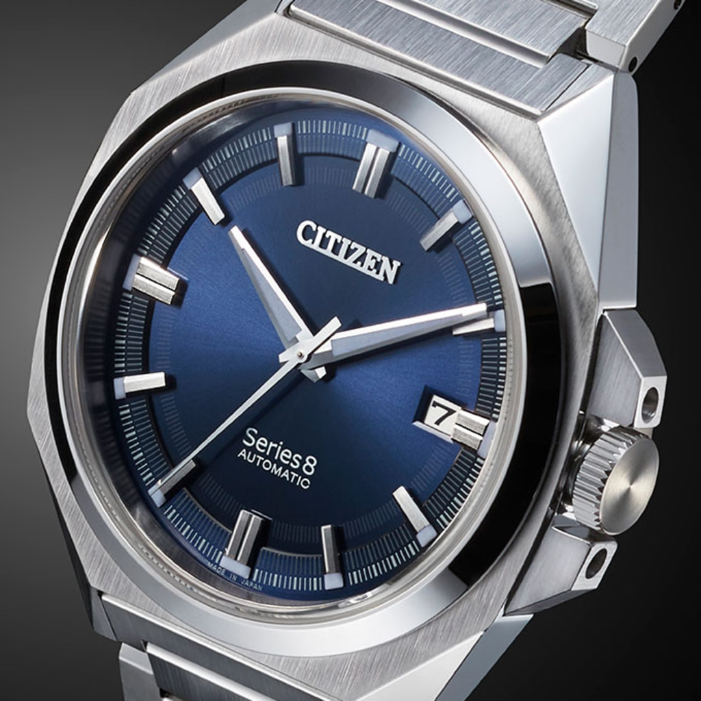 Citizen Series 8 automatic watch with a blue dial and silver bracelet.