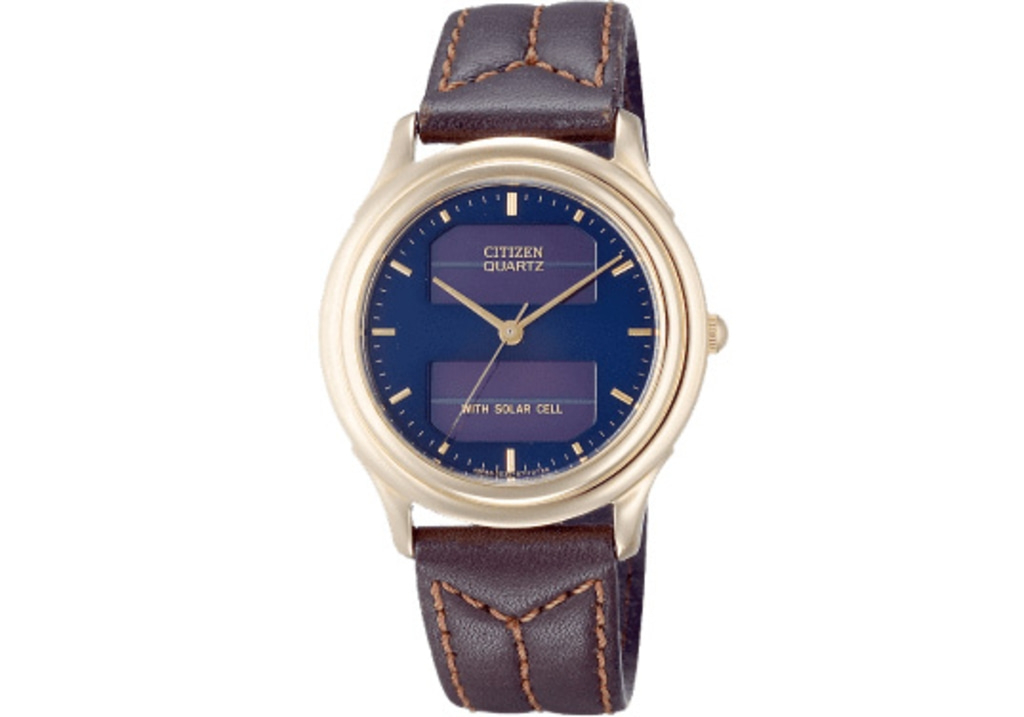Citizen Quartz watch with a blue face and brown leather strap.