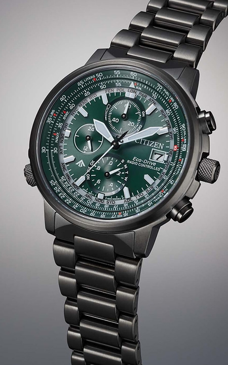 Green Citizen watch with a black strap and a detailed dial, perfect for aviation enthusiasts.
