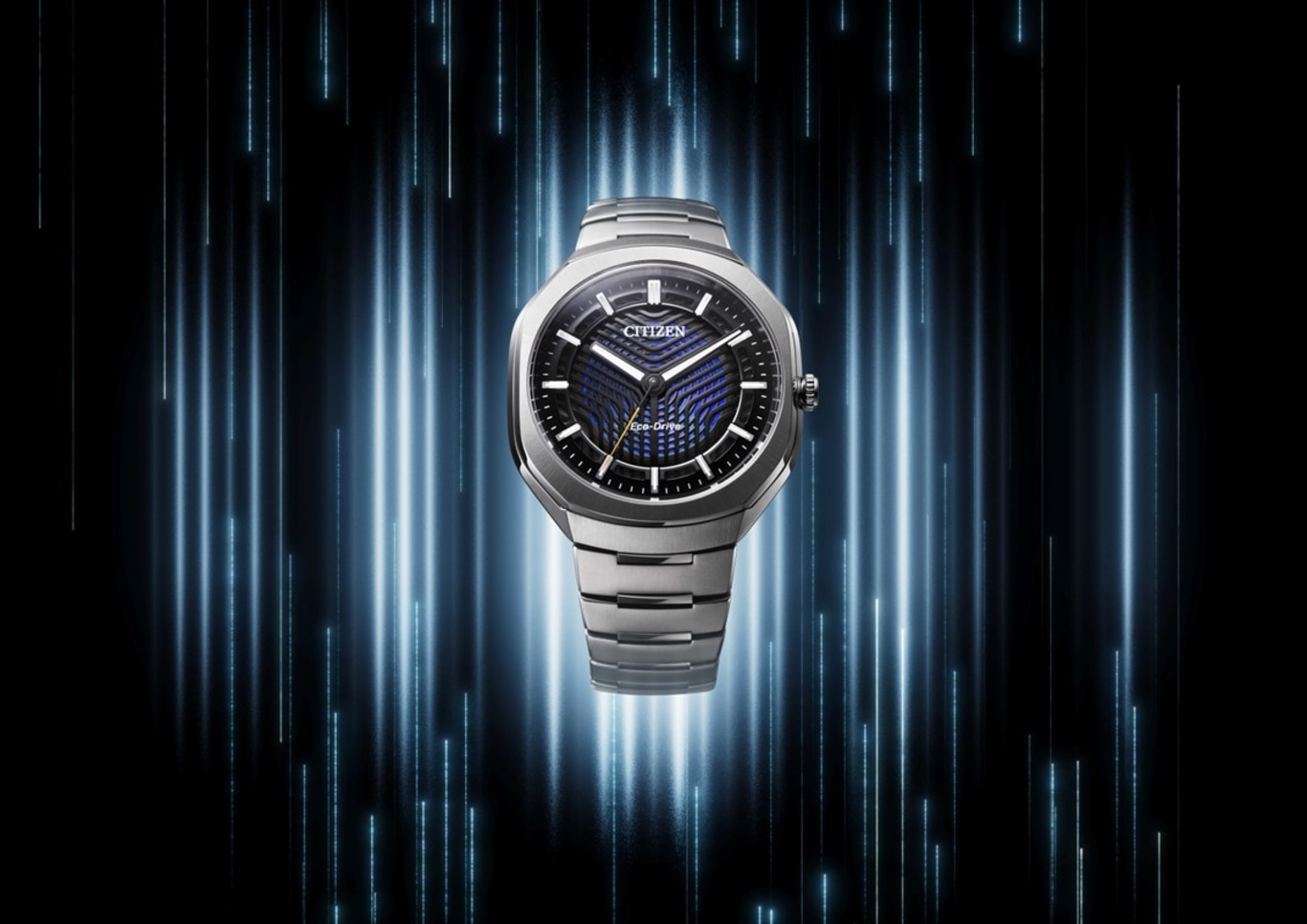 A modern Citizen Eco-Drive watch with a blue and black dial, set against a dark background with glowing blue light streaks.