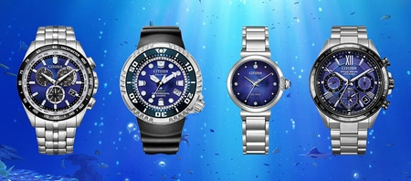 Citizen watches on blue background, four different models, stainless steel and blue dials.