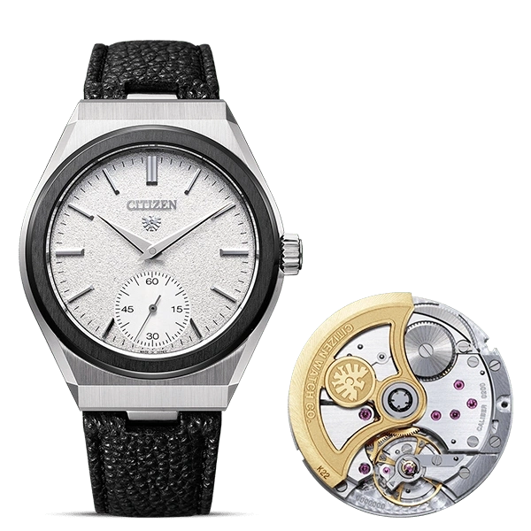 Citizen watch with a black strap and its inner mechanism.