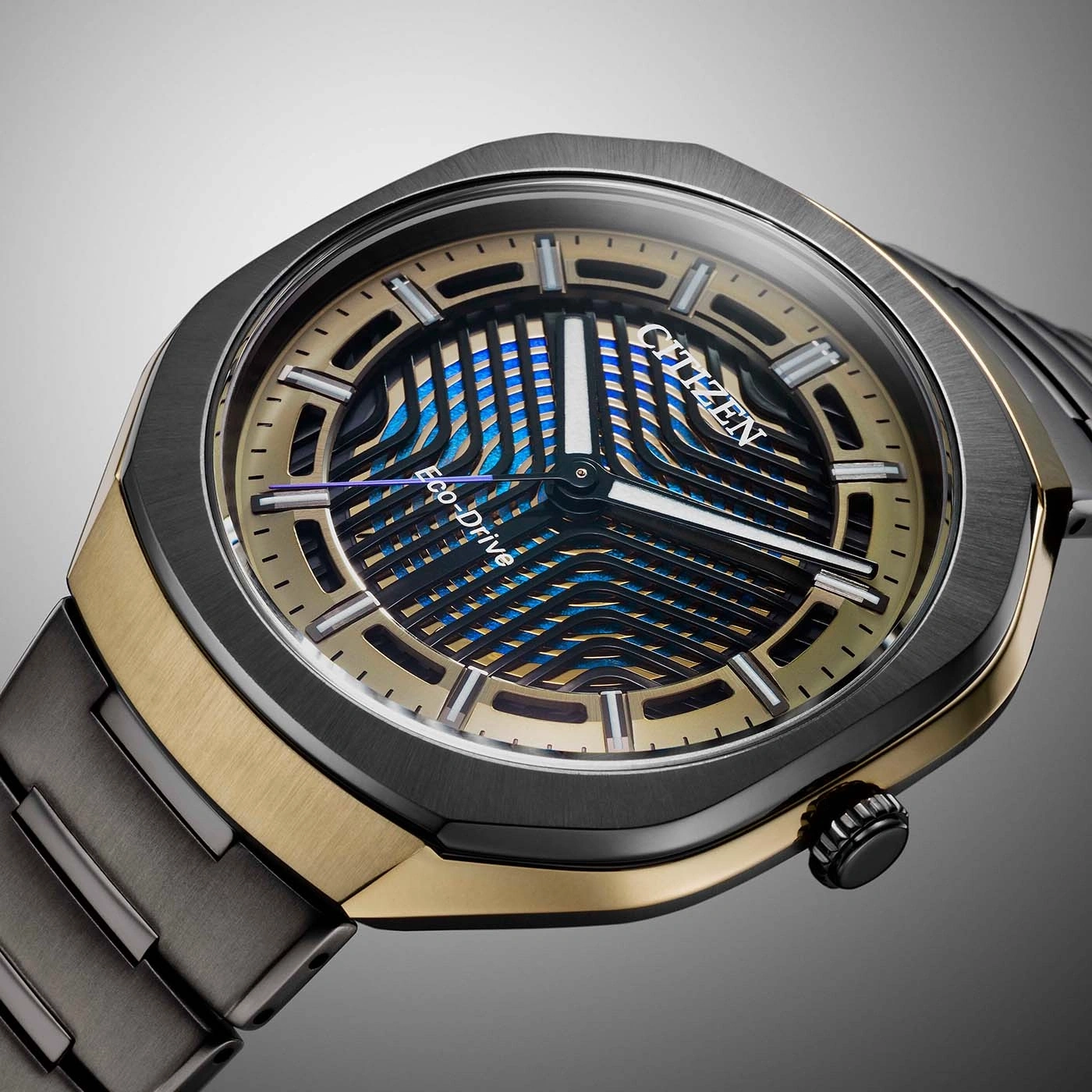 A modern Citizen Eco-Drive watch with a striking blue and gold dial.