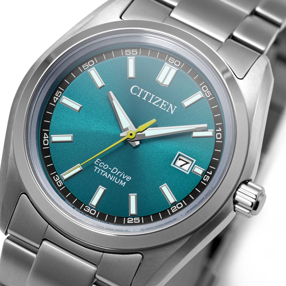 Close-up of a teal Citizen Eco-Drive Titanium watch face.