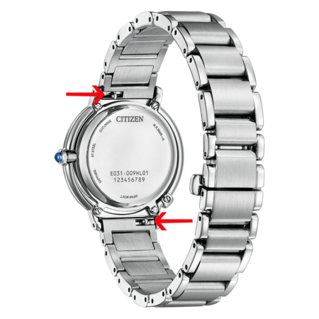 Citizen watch back with arrows pointing to the clasp and band connections.