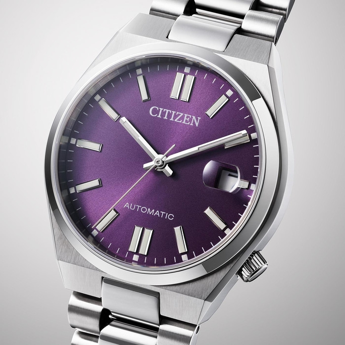 Citizen watch with purple face and silver band, automatic movement.
